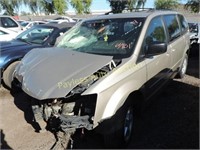 2009 Dodge Grand Caravan 2D8HN44E89R689856 Tan