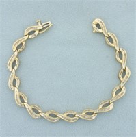 Baguette Diamond Tennis Bracelet in 14k Yellow Gol