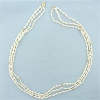 Triple Strand Baroque Pearl and Gold Bead Necklace