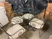 Glass table with 4 chairs