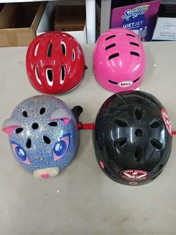 4 bicycle helmets