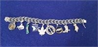 Sterling silver charm bracelet with charms 7.5"lon
