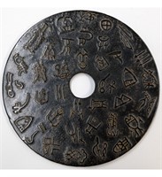 A Carved Jade Bi Disc With Strange Markings
