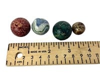 (4) antique clay marbles incl. shooters