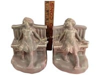 Rookwood pottery bookends girl reclining on bench