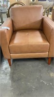 Esin top grain genuine leather upholstered seat.