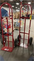 (Q) 2 MILWAUKEE HD HAND TRUCKS, TIRES MAY NEED