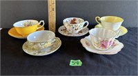 5 tea cups and saucers