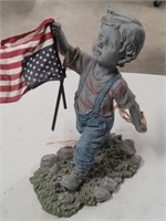 Boy Holding US Flag In Overalls Sculpture