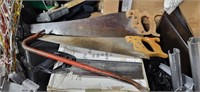 Group of hand saws plus crowbar