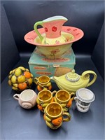 Assorted Ceramic Cups Bowls and Teapot