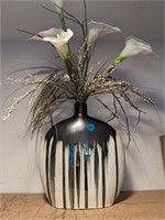 Large decorative vase with fake flowers