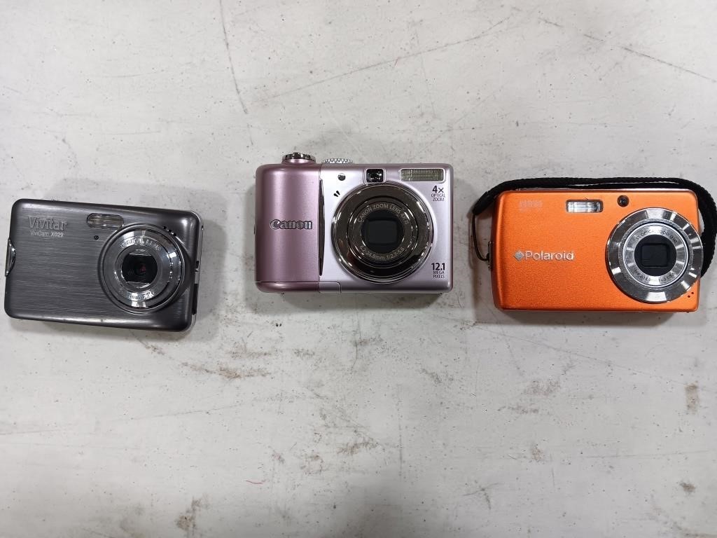 Cameras - 
Polaroid, Canon, Vivitar