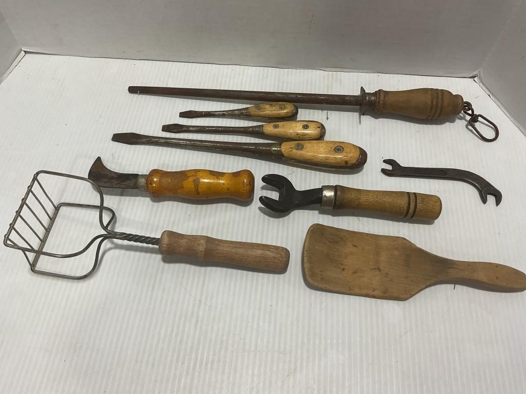 Lot of vintage tools, wooden spoon, and more