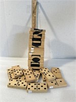 Large handmade domino set held together by a