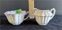Tea cup and creamer
