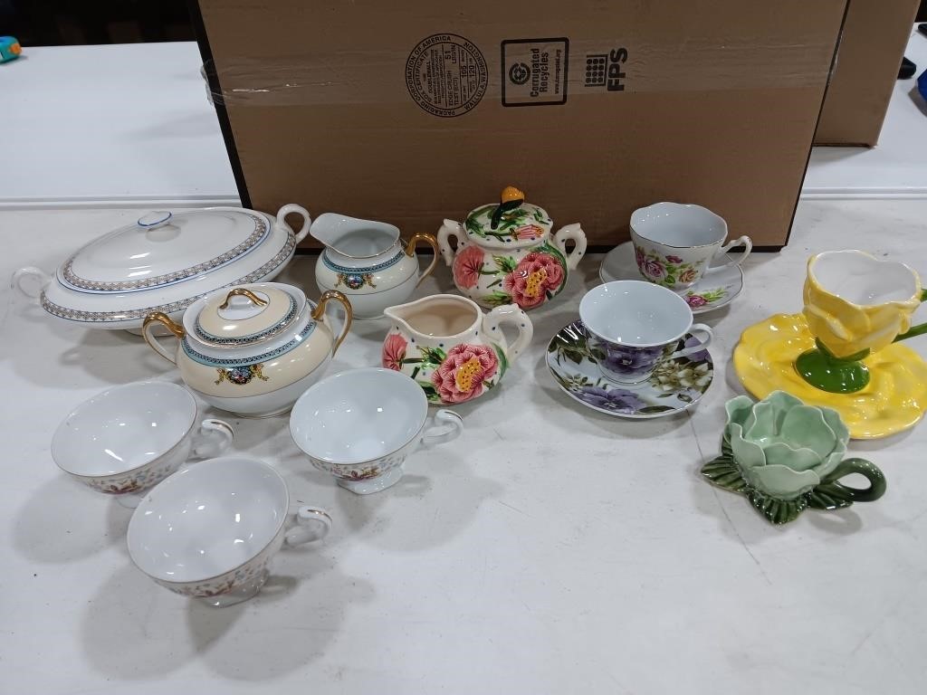 Tea cups,saucers, serving bowl, sugar, creamer
