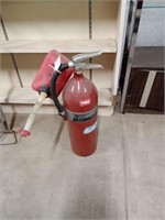 Fire extinguisher and gas can