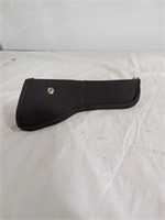 Nila on gun holster