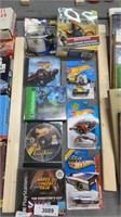 Hot wheels, PlayStation games and motocross toy