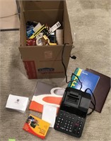 Box full of office supplies