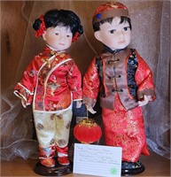 Pr Asian porcelain dolls w/stands