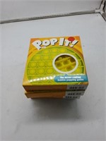4 yellow pop it toys
