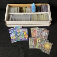 Box filled with over 1000 Pokemon Cards