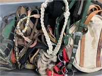 Large tote of used tack supplies