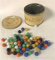 VINTAGE REXALL TIN WITH MARBLES