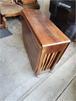 Mid century modern Drop leaf stowaway table w/4