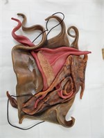 Beautiful leather Mexican mask art made by Emi -