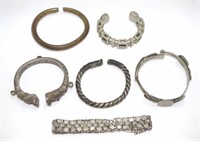 Six West African metal bracelets/anklets