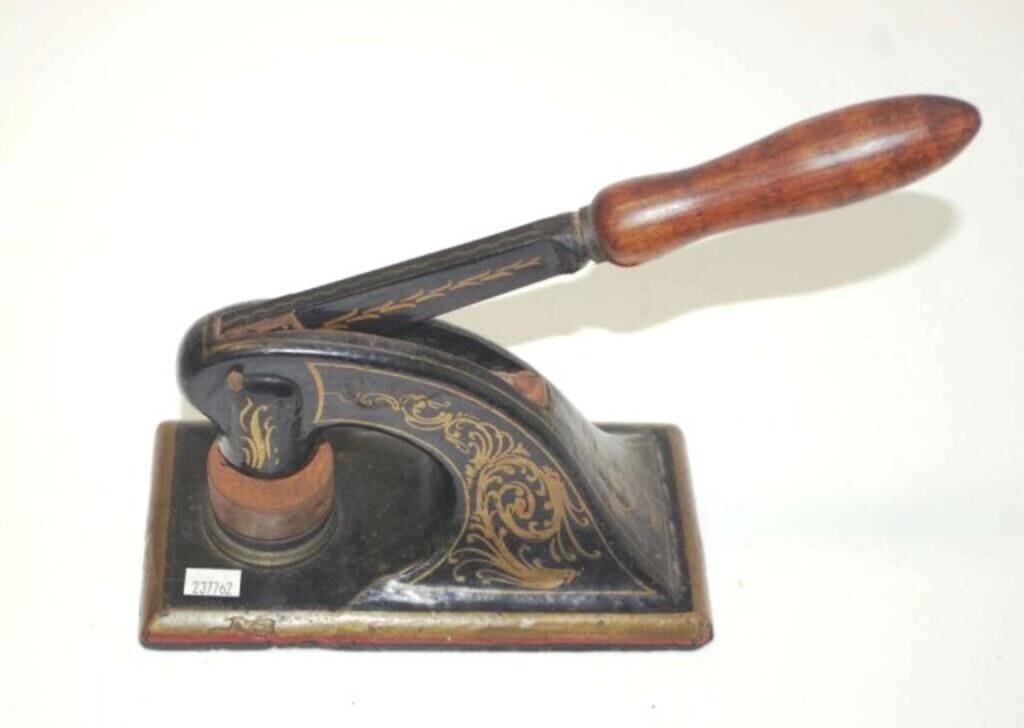 Antique cast iron seal press