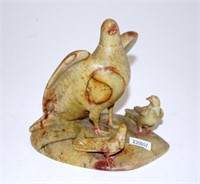 Carved stone birds figure