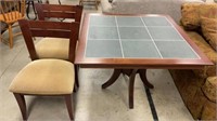 Tile top table with two chairs