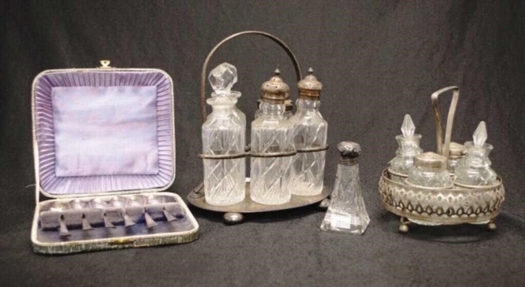 Two antique silver plated and glass cruet sets