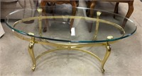 Glass top brass coffee table