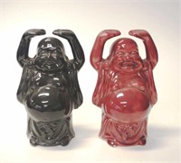 Two Oriental ceramic figures of 'Laughing Buddha'