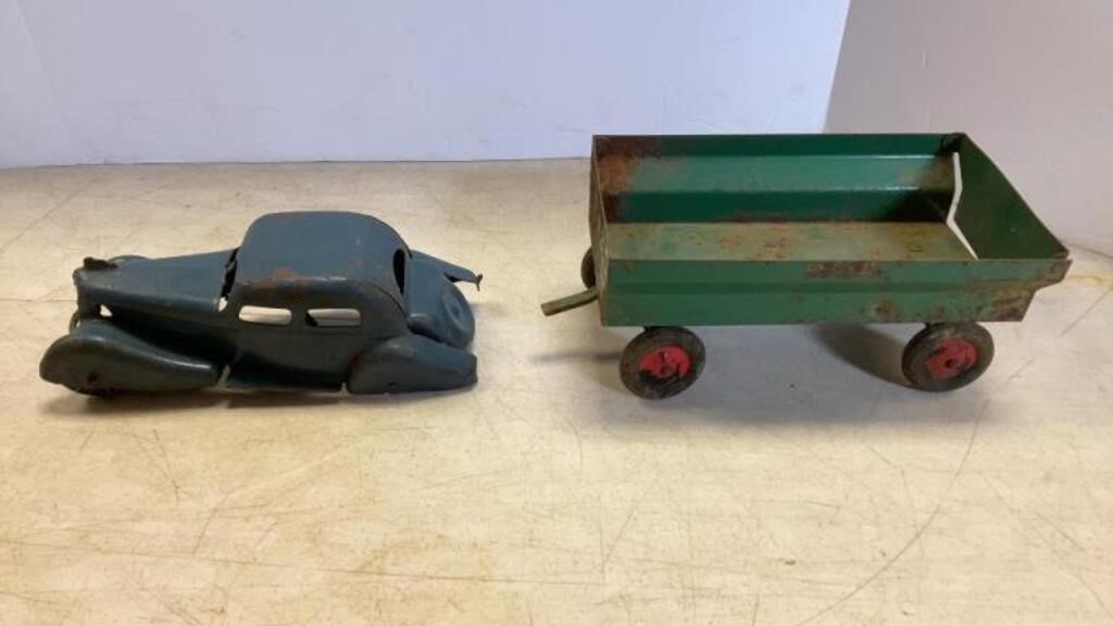 Pressed steel car and Oliver wagon, both have