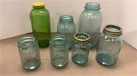 Blue jars and juice bottle