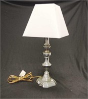 Metal based electric lamp