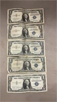 Vintage one dollar bills with blue seals