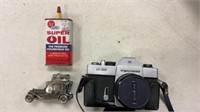 Argus camera, lighter & oil can