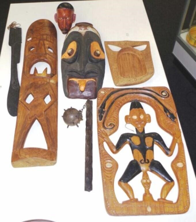 Group Papua New Guinea carved artifacts