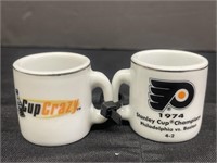 Two NHL Champions Collectible Mini Mugs.