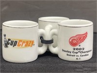 Three NHL Champions Collectible Mini Mugs.