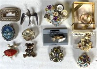 12 brooches and or  pins
