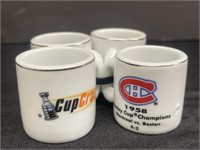 Four NHL Champions Collectible Mini Mugs.