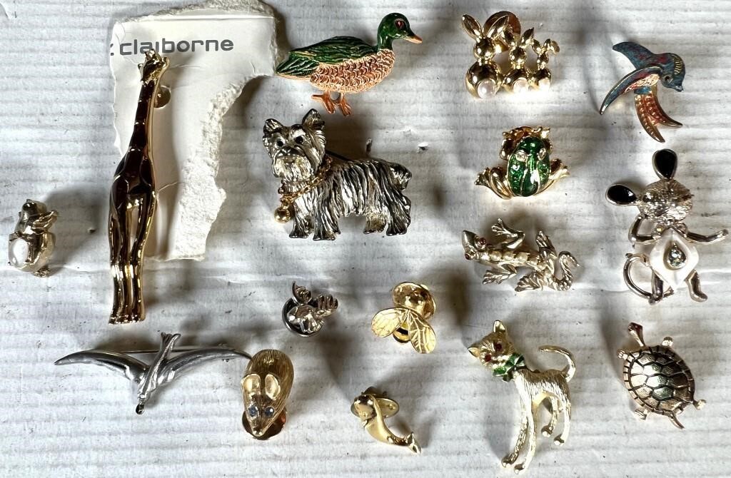 16 brooches and or pins